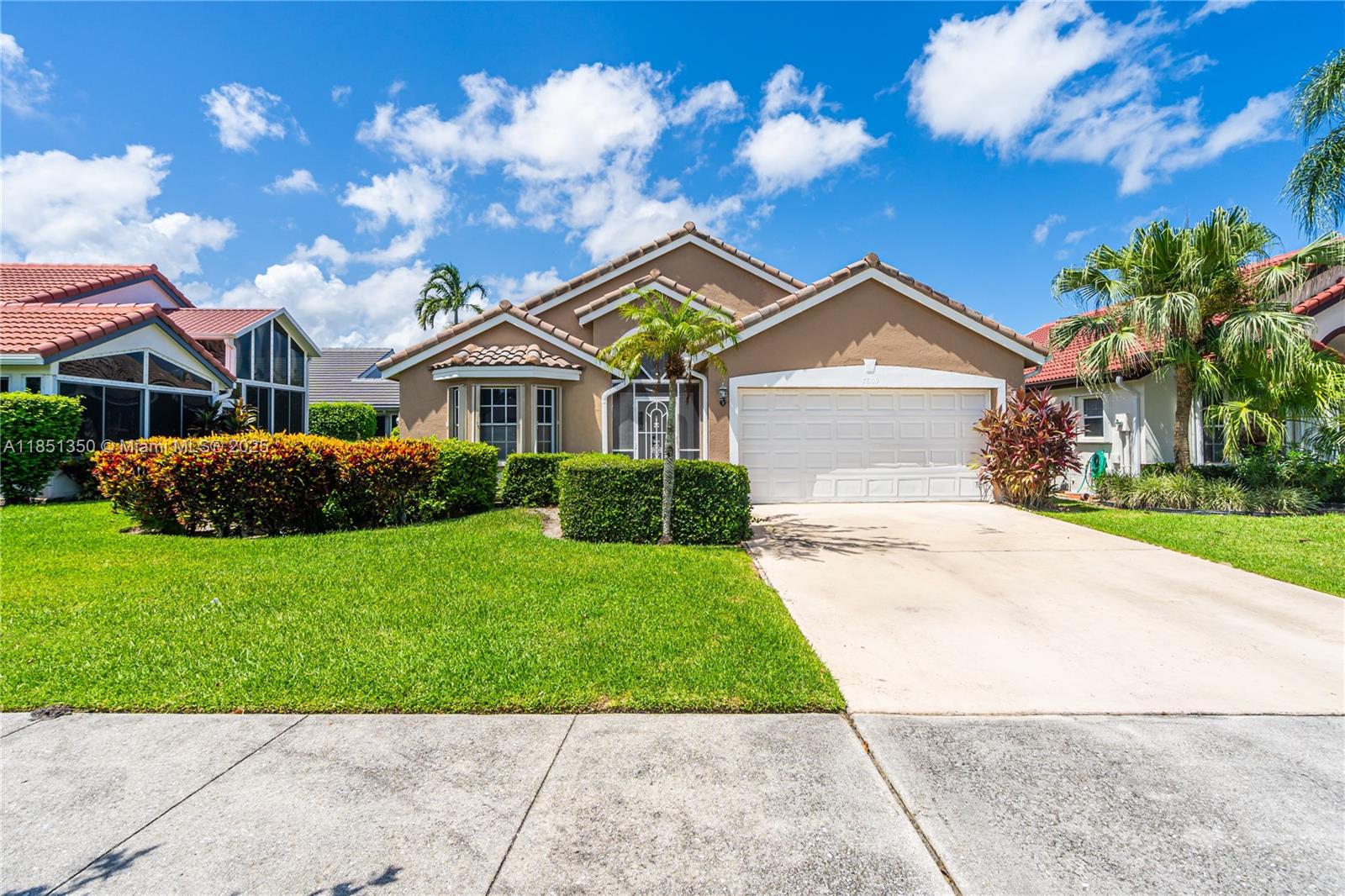 Great Location! Stunning home located in the heart of Delray Beach, a quiet gated community! This beautiful property is located in a fabulous location! With a back patio that has a lovely lake view. With 4 bedrooms and 3 full bathrooms, everything is in excellent condition. The bathrooms have been upgraded, and the kitchen is charming, offering plenty of cabinet space. Equipped with accordion shutters and beautiful tile flooring throughout the home, it boasts excellent natural light , a split floor plan, and vaulted ceilings. Delight in the low HOA fees, which covers lawn care and access to fantastic amenities, close to restaurants, shopping, beaches, cultural attractions, the turnpike and I-95.