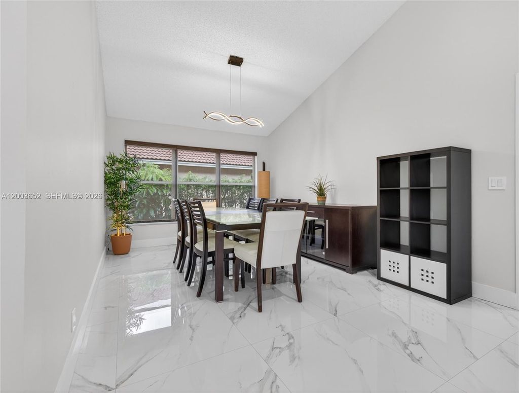 Photo of 1025 Creekford Dr, Weston, FL 33326 (MLS # A12003652)