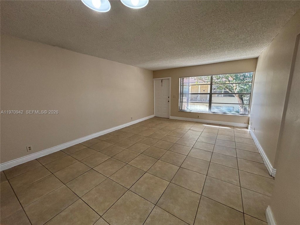 Photo of 11526 Royal Palm Blvd #11526, Coral Springs, FL 33065 (MLS # A11970942)