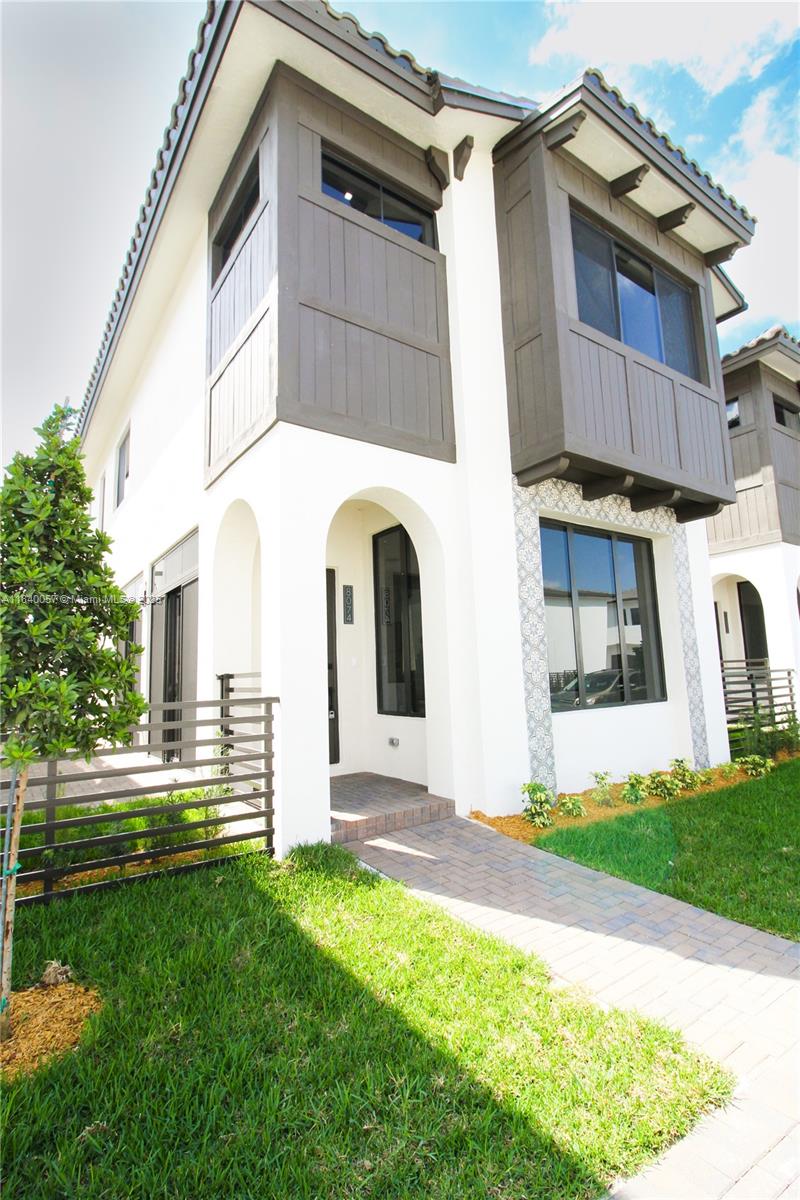 Like-new 2023 home in the highly sought-after Canarias Downtown Doral. Fully upgraded 4-bedroom, 4-bathroom home with a full bedroom and bathroom on the first floor, perfect for guests or multi-generational living. This home comes with all developer features, from fully built closets, custom blinds, a laundry sink, glass shower doors in all bathrooms, premium wood floors for the staircase & kitchen cabinets, large ceramic tile floors throughout, smart kitchen appliances & thermostat, and more. Ultimate accessibility with direct street access, an extra parking space behind the backyard, and ample street guest parking available in front. Just steps away from all Downtown Doral has to offer, like shops, restaurants, urgent care, schools, and a vibrant cultural center.