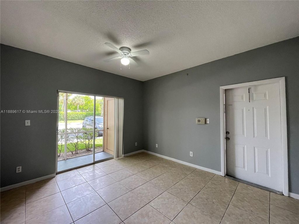 Photo of 840 Cypress Park Way #B3, Deerfield Beach, FL 33064 (MLS # A11889617)