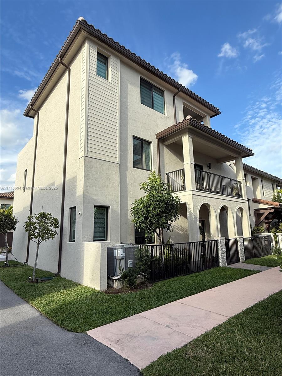 Upgraded luxury 3 story corner townhouse with two roof top terraces. Views of the Paseo Urbana and downtown Doral Skyline. All new vinyl plank floor covering throughout living area on first and second floor with ceramic tiles on third floor and bathrooms. 3 full bedrooms with custom closets, 2 full bathrooms and two 1/2 bathrooms. Laundry area and pantry with custom built ins. Outdoor covered summer kitchen in 3rd floor terrace as well as a second open terrace. Custom floor covering in two car garage with custom storage shelfs. Wired for electric car charging. Smart home with both front door and garage door accessed from app as well as central AC, lights and security system.
