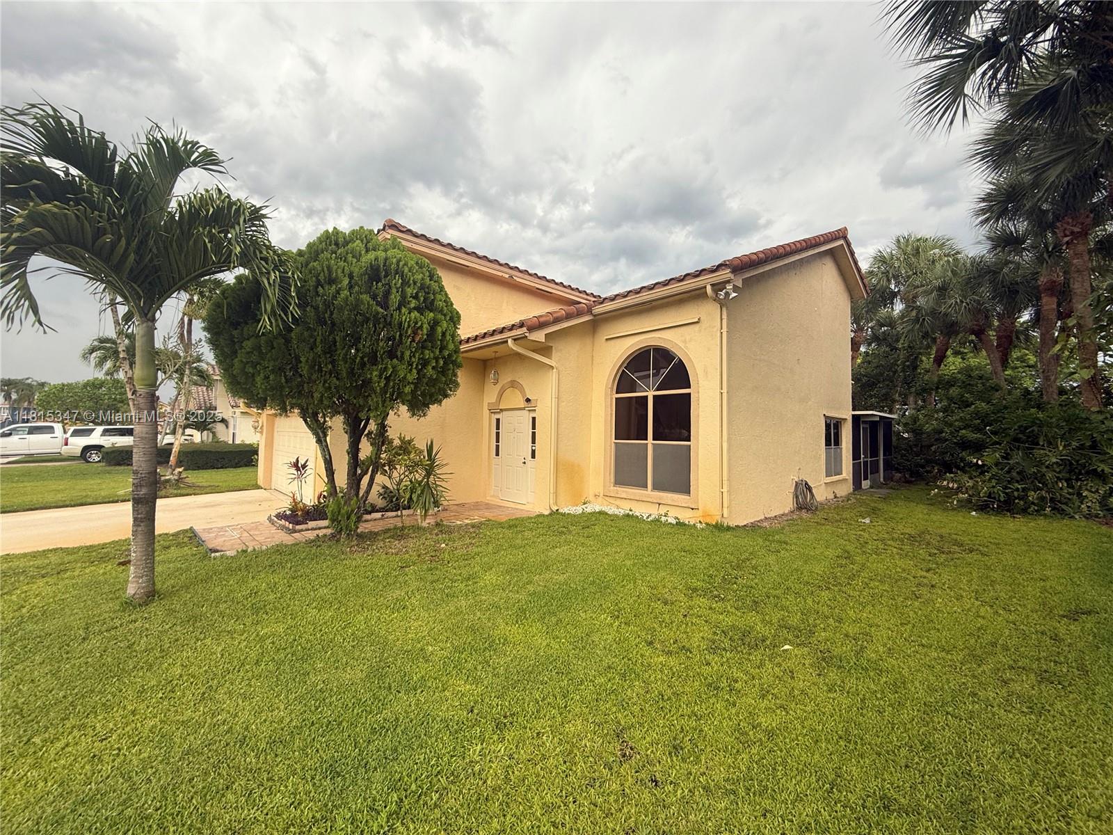 Charming 3-bedroom, 2,5 bath home located in a desirable gated community in Boynton Beach. This corner lot property features a 2-car garage, a private backyard, and plenty of potential. One-owner home with a 2015 roof; all other features are original. Ideal for buyers looking to personalize and bring new life into a well-loved space. Easy to show—schedule your appointment today! Call Valeria For Showings and any information. VERY MOTIVATED SELLER.