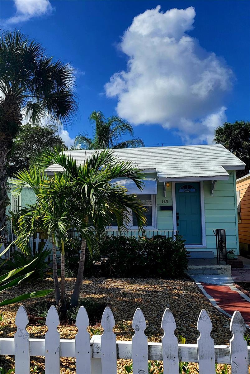This adorable 2/ 1 single family home has the prefect walkability near all the restaurants and activities Lake Worth has to offer! Minutes to the beach. The charming living room was beautiful high ceilings with wood beams. The primary bedroom has a queen bed and the 2nd room has a double daybed. Enjoy the back yard fire fit with string lights and dining area. Pick and eat star fruit right from the back yard. Parking is available behind the home and washer and dryer are in the unit. More pics to come. Pets considered on case by case basis and no aggressive breeds. Quick move in with no HOA application. Includes internet, water, and electric. Move right in!