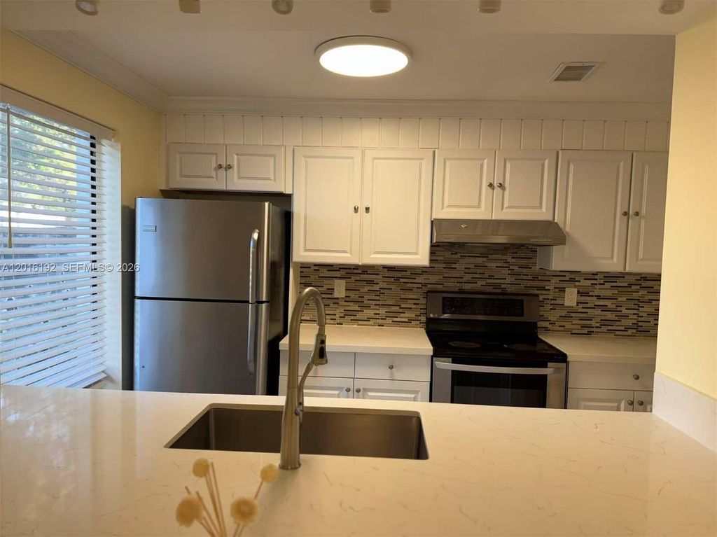 Photo of 4206 NW 114th Terrace #1, Coral Springs, FL 33065 (MLS # A12016192)