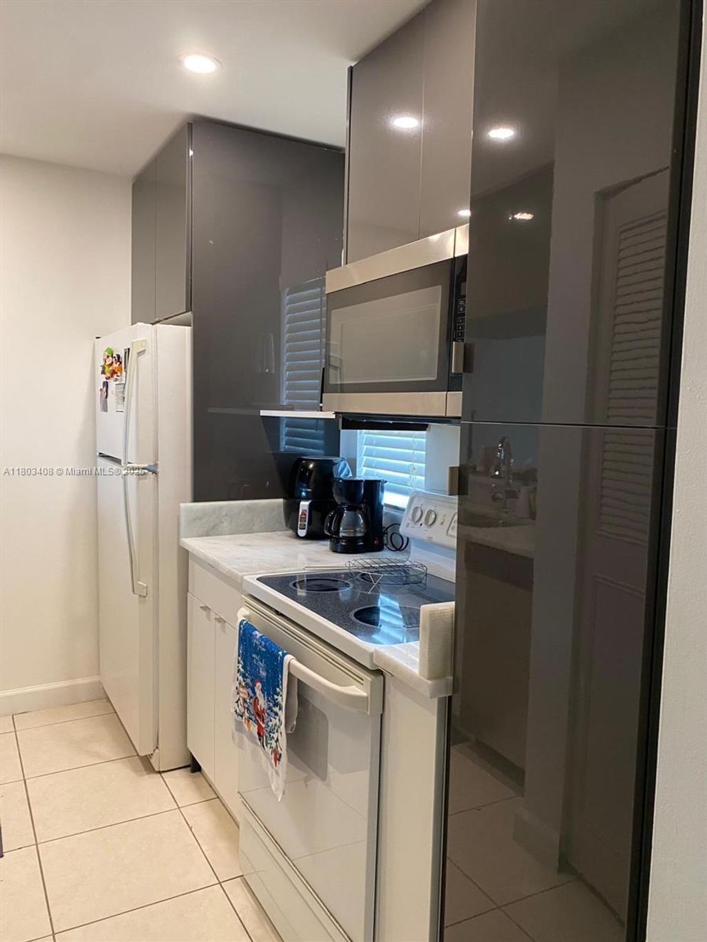 Photo of 931 Twin Lakes Dr #3-I, Coral Springs, FL 33071 (MLS # A11803408)