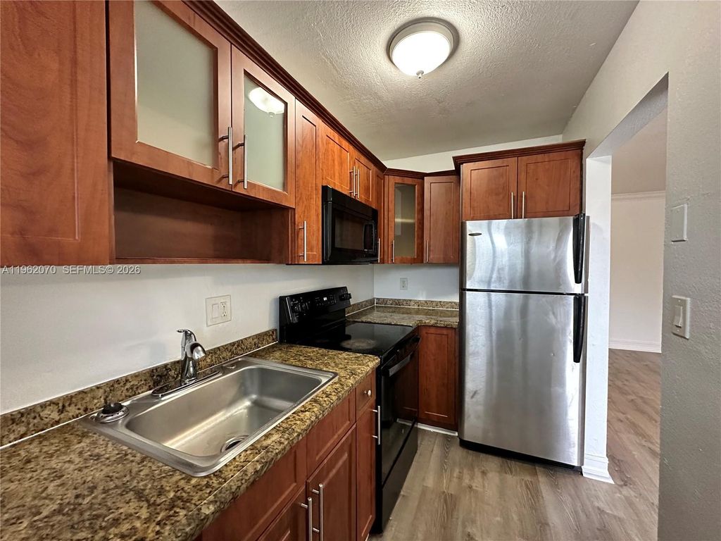 Photo of 1400 NE 56th St #310, Fort Lauderdale, FL 33334 (MLS # A11962070)