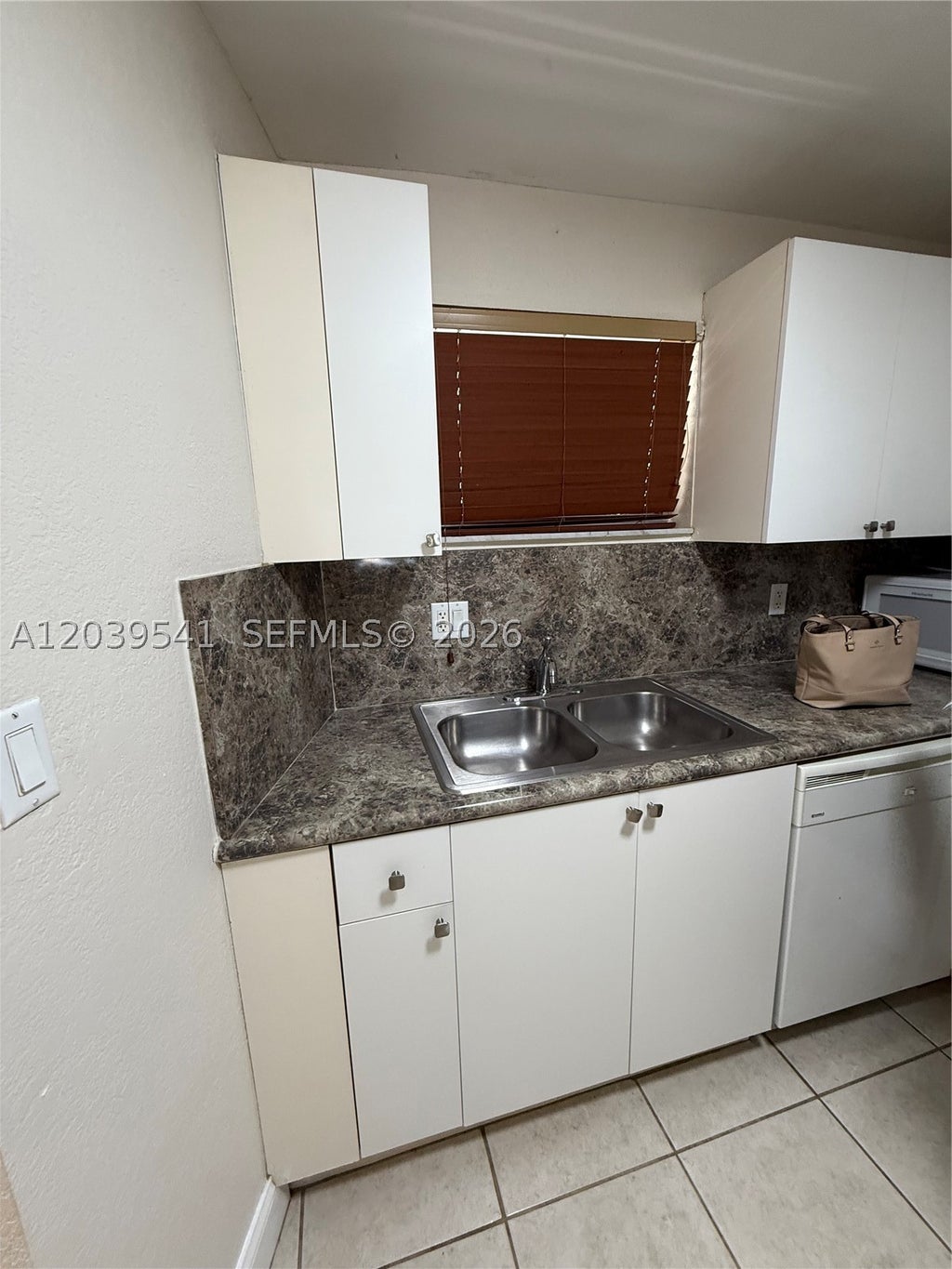 Photo of 4205 N University Dr #309, Sunrise, FL 33351 (MLS # A12039541)