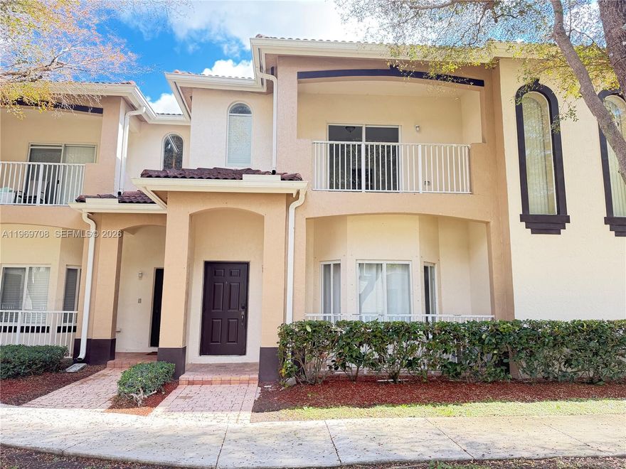 Updated 2 bedroom 2.5 bath Townhouse in the highly desirable Arbor Park community within Keys Gate Golf and Tennis Country Club, offering easy low maintenance living in a gated, friendly neighborhood with lush green views. Tile and wood floors throughout home, recessed lighting, and abundant natural light. Primary suite features dual sinks, a stand alone tub and shower. Second bedroom is a junior suite with its own bathroom and a private balcony overlooking the garden. Includes 1 car garage plus 2 driveway spaces, separate laundry room, private fenced patio, covered front porch. Located directly in front of the community pool and playground just a one minute walk, making it ideal for families and everyday convenience. HOA is $690 per month and includes roof coverage, exterior insurance plus cable and internet, which are usually separate monthly bills. It also includes 24 hour gated security, a resort style pool, playground, tennis courts, and full common area maintenance. Minutes from A rated public and charter schools, BJ’s, Target, Homestead Baptist Hospital, and just 30 minutes from the Florida Keys. FHA and Conventional welcome buyers with as little as 3% down payment.