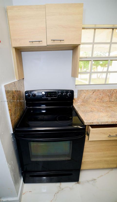 Tiny photo for 298 NW 104th St, Miami, FL 33150 (MLS # A12000637)