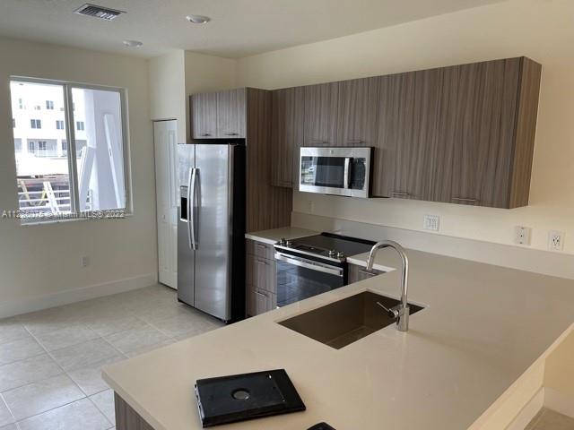 Photo 3 of 11 of 6450 NW 102nd path 103 townhome