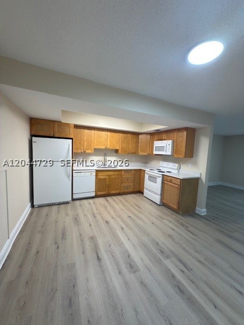 Photo of 8303 W Sample Rd #04, Coral Springs, FL 33065 (MLS # A12044729)