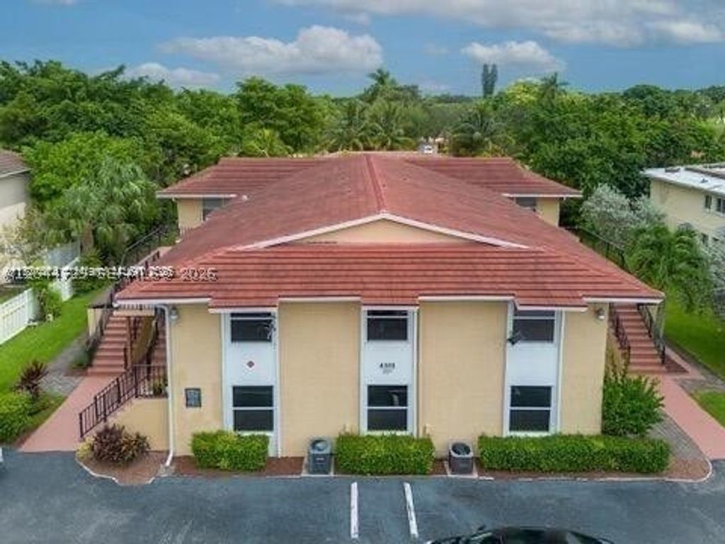Photo of 8303 W Sample Rd #04, Coral Springs, FL 33065 (MLS # A12044729)
