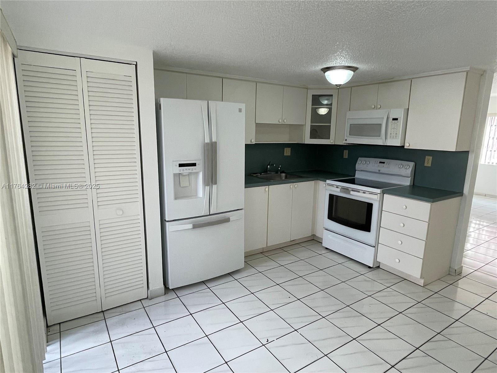 LITTLE HAVANA TOWNHOMES C - Residential Lease