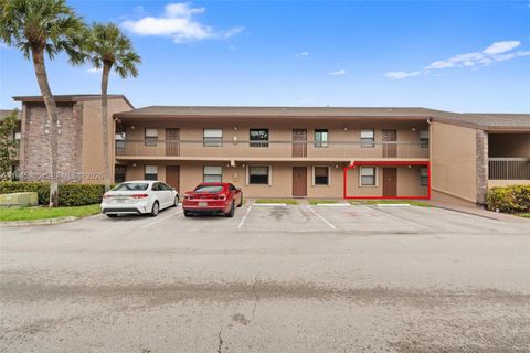 Photo of 10005 S Winding Lake Rd #106, Sunrise, FL 33351 (MLS # A11945805)