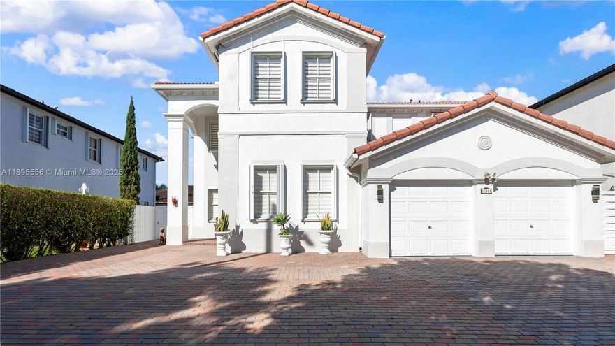 Spacious two-story single-family home with over 3,000 sq ft of living area in desired Century Gardens in the heart of Miami Lakes, NO HOA approval required, this property is ready for move in. Freshly painted all white, Features a full bedroom and bath downstairs, huge kitchen with island and stainless-steel appliances, built-in closets, and zebra blinds. Enjoy a large driveway, two-car garage with A/C, and a fenced backyard with pergola and storage shed. Prime location close to schools, shopping, and highways. Don't miss this opportunity!