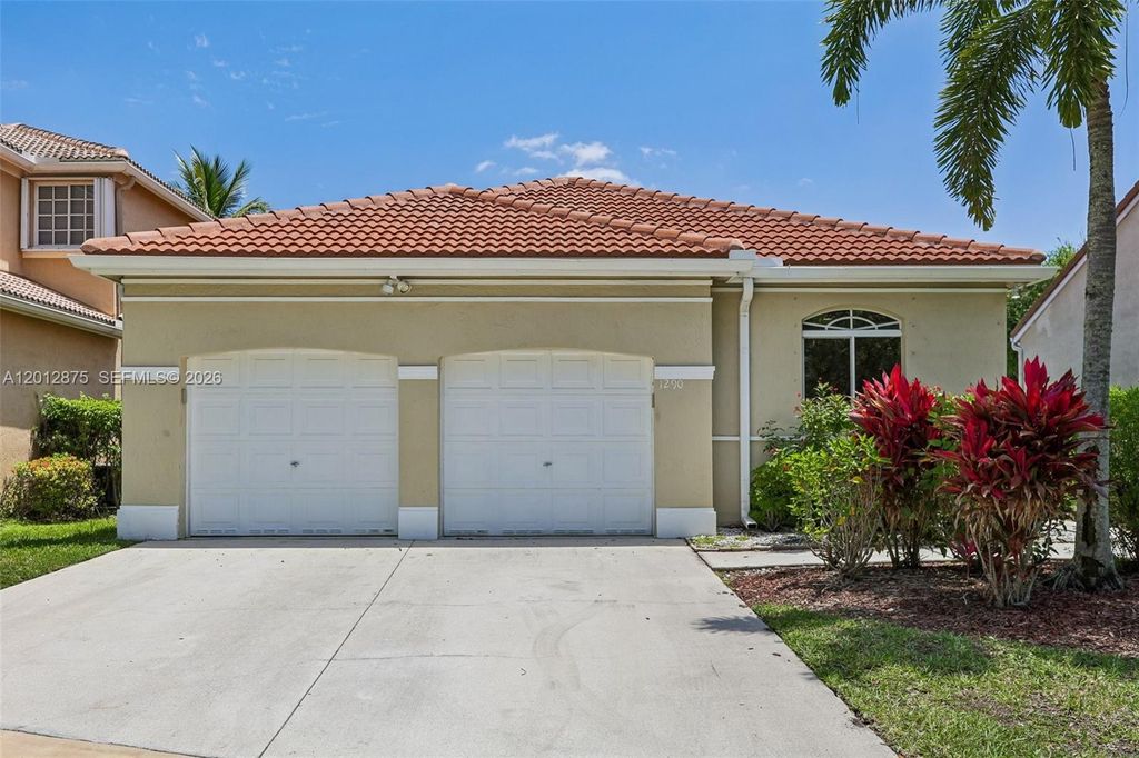 Photo of 1290 Camellia Ln, Weston, FL 33326 (MLS # A12012875)