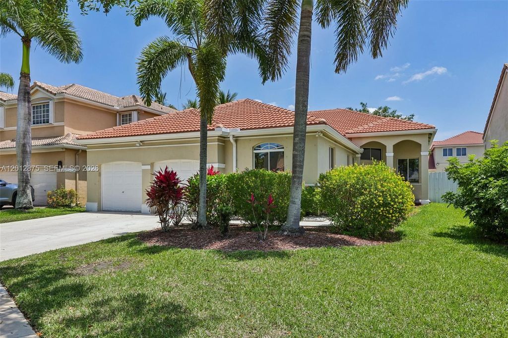 Photo of 1290 Camellia Ln, Weston, FL 33326 (MLS # A12012875)