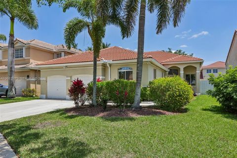 Photo of 1290 Camellia Ln, Weston, FL 33326 (MLS # A12012875)