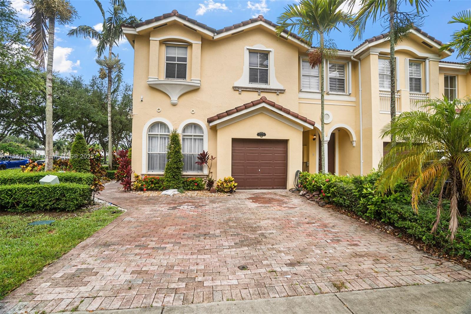 Grand Lakes Townhome community is an excellent location close to FIU, expressways and all your shopping and dining needs. This meticulous and spacious 4/3, corner unit with one bedroom and full guest bath downstairs. The unit features double door entrance to master suite with sitting area and large walk-in closet, spacious second floor landing, upstairs laundry room, ceramic floors downstairs with laminate flooring upstairs. Patio with pavers and fence is perfect for entertaining. Great amenities include Clubhouse with fitness center, two pools, two playgrounds, basketball and tennis courts and guest parking. Low HOA fees