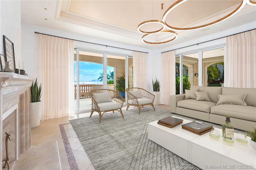 Experience Fisher Island at it's finest in this stunning ground floor Bayview residence! This one of a kind gem greets with you with 4 bedrooms, 4.5 baths, high ceilings, expansive wrap around terraces overlooking the Miami downtown skyline, Biscayne Bay and Virginia Key. The unit has been renovated. Features include: marble floors throughout, top of the line kitchen and bathrooms, smart house, walk in closets, Venetian stucco, automated window treatments, etc. Live the Fisher Island lifestyle in this exceptional offering! Photos with furniture have been virtually staged. Easy to show!