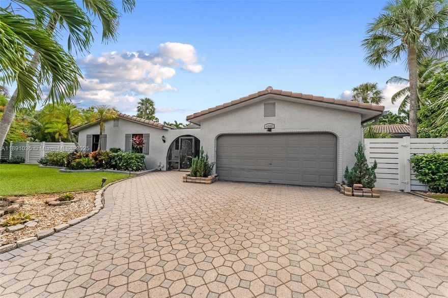 Welcome to this beautifully updated 4-bed, 2-bath home nestled on a quiet cul-de-sac in Coral Springs. Featuring a spacious layout with separate living and dining areas, a modern kitchen with granite countertops, stainless steel appliances, and a wine cooler—perfect for entertaining. Step outside to a private fenced backyard with a screened patio, built-in grill, and a fenced in pool. Recent upgrades include a newer tile roof, impact windows and doors, newer HVAC, and a generator. No HOA and close to top schools, parks, shopping, and dining.
