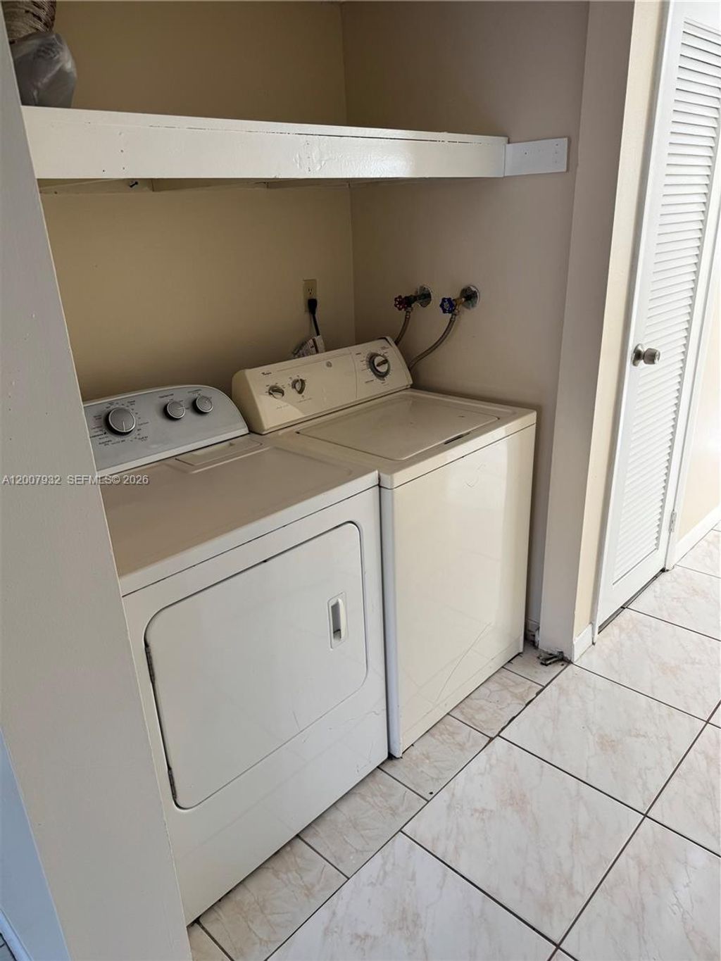 Photo of 5841 Blueberry Ct #77, Lauderhill, FL 33313 (MLS # A12007932)