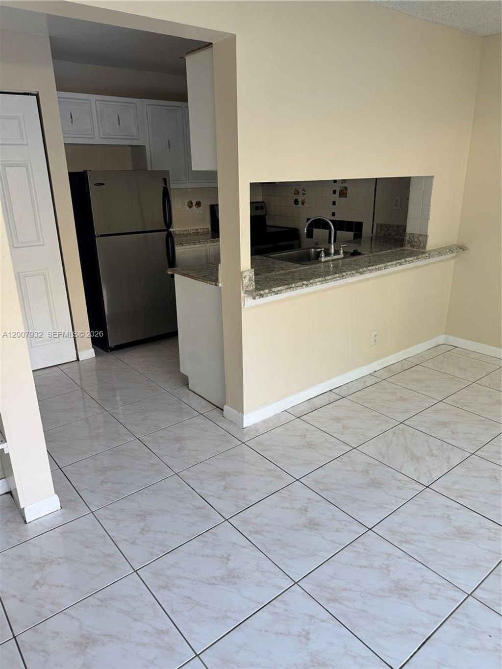 Photo of 5841 Blueberry Ct #77, Lauderhill, FL 33313 (MLS # A12007932)