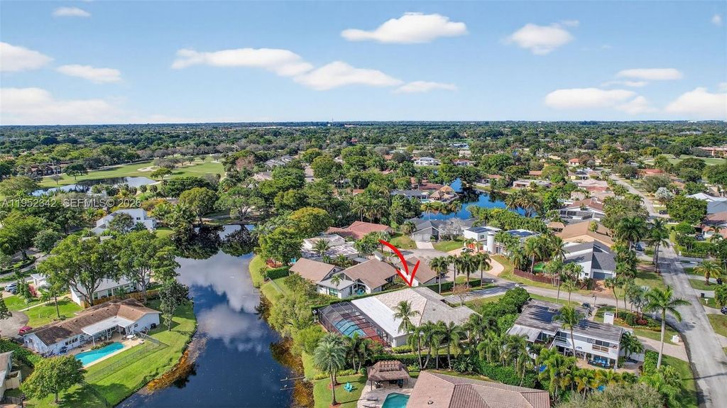 Photo of 8704 Mahogany Ave, Plantation, FL 33324 (MLS # A11952342)