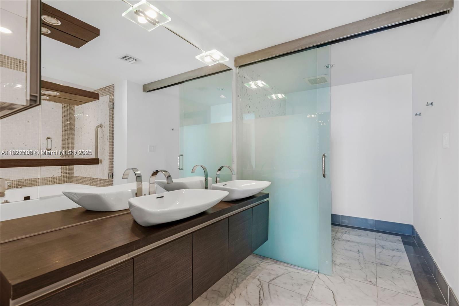 Discover urban luxury in this stunning 1-bedroom, 1.5-bathroom condo for rent in the heart of Brickell. Featuring a spacious open floor plan with floor-to-ceiling windows. Kitchen boasts high-end appliances, sleek cabinetry, stone and countertops. Primary suite includes a walk-in closet and spa-inspired bathroom. Located in a prime building, enjoy access to resort-style amenities including a pool, and state-of-the-art fitness center. Situated steps from Brickell City Centre, with fine dining, and vibrant nightlife, this condo offers the perfect blend of style, comfort, and convenience.