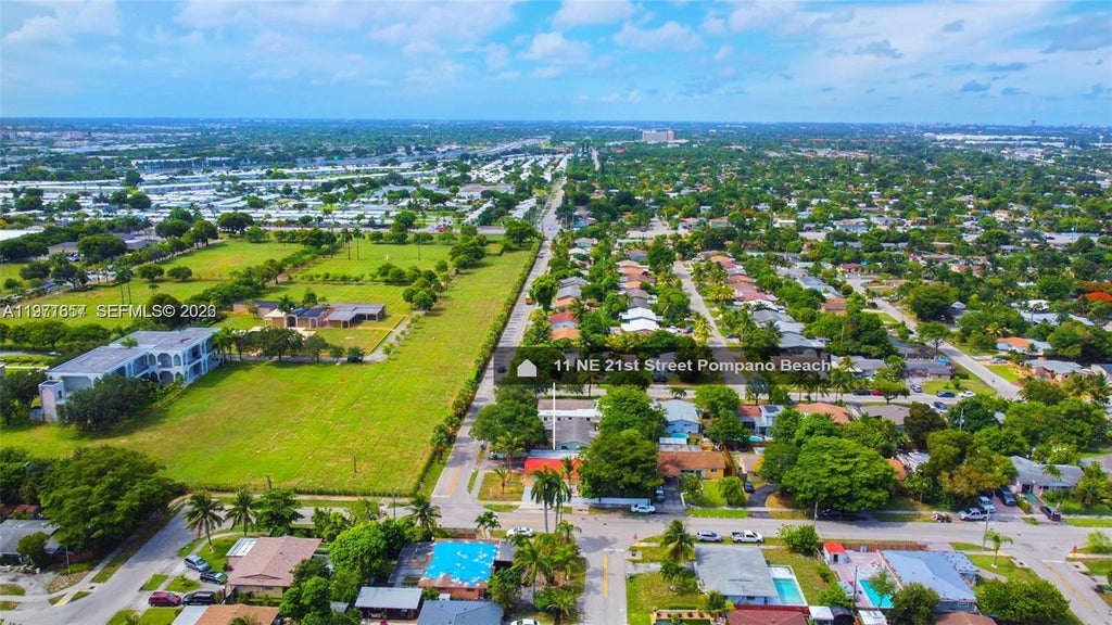 Photo of 11 NE 21st St, Pompano Beach, FL 33060 (MLS # A11971657)