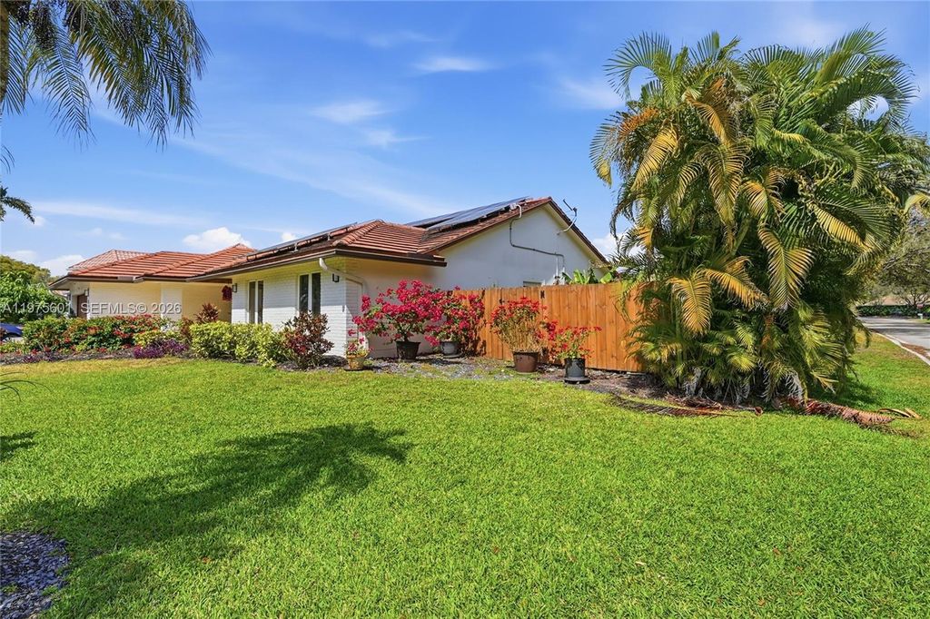 Photo of 10003 NW 53rd Ct, Coral Springs, FL 33076 (MLS # A11975601)