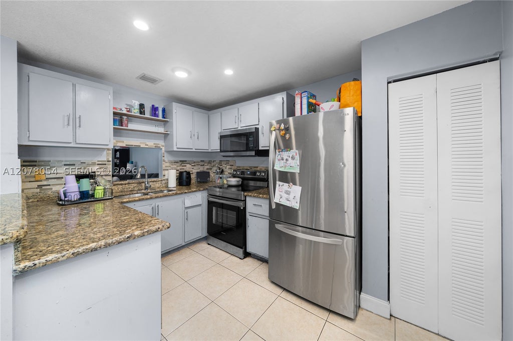 Photo of 1293 Sussex Dr, North Lauderdale, FL 33068 (MLS # A12078054)