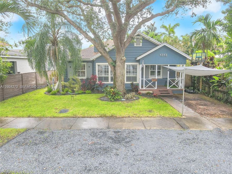 Beautifully remodeled home in the heart of Victoria Park, just minutes from vibrant Las Olas Blvd. This charming residence offers 4 bedrooms and 3 full bathrooms, blending modern updates with timeless Southern character. The home features hurricane impact windows and doors, a newer roof and a thoughtfully updated kitchen and bathrooms. Inside, you’ll find stunning wood floors and a striking vaulted ceiling with exposed wood beams that create a warm, inviting living space. A cozy fireplace adds to the home’s charm, while granite countertops and direct access to a screened-in porch make the kitchen perfect for both everyday living and entertaining. Step outside to your private oasis—an expansive, lushly landscaped backyard complete with a gas heated pool and spa. The fenced yard offers both privacy and plenty of space to relax or host guests. A separate in-law suite with private rear alley access provides flexible living options, ideal for guests, extended family, or rental income. This home perfectly combines comfort, style, and location—an exceptional opportunity in one of the area’s most desirable neighborhoods