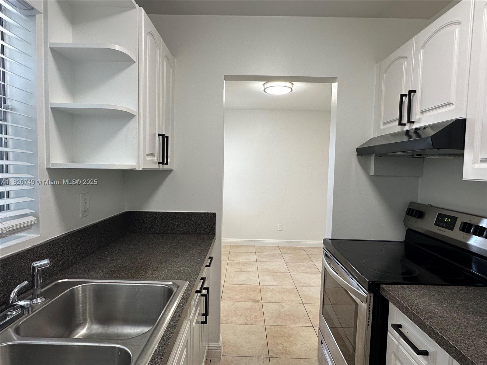 SPACIOUS, newly updated 1 bedroom/1bath apartment in Davie!!! Charming 2nd floor unit with beautiful tile flooring, new lighting and central AC. Very large living and dining room area with full kitchen and brand new appliances. Plenty of closets for ample storage space. Located in a quiet community, with a full laundry room on-site. Waste, maintenance, pest control + 1 assigned parking space included in rent. Guest parking on property. Pets welcome with 1x pet fee. Property is in a great area - centrally located yet tucked away on a quiet street, close to all of the major highways (A1A, US1, I-95, turnpike etc). Down the street from Nova! Everything nearby such as shops, restaurants, schools, and parks...Only 10 min from Hard Rock, Seminole Classic Casino, Dania Point, Broward Mall & more!