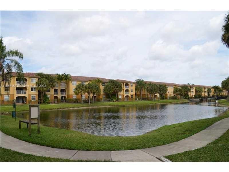 SPACIOUS AND BEAUTIFUL 2/2 IN GATED COMMUNITY LA VIA, CERAMIC TILE IN LIVING AREAS AND LAMINATE WOOD IN BEDROOMS, HIGH CEILINGS, OPEN KITCHEN WITH WASHER AND DRYER, LAKE VIEW FROM BALCONY, LARGE MASTER BEDROOM WITH WALK IN CLOSET, ON THE 3RD FLOOR. CLUB HOUSE, SWIMMING POOL, GYM, PLAYGROUND, TENNIS AND PICKLEBALL. CLOSE TO MALLS, HOSPITALS, AND HIGHWAYS. GREAT RESTAURANTS IN THE AREA.