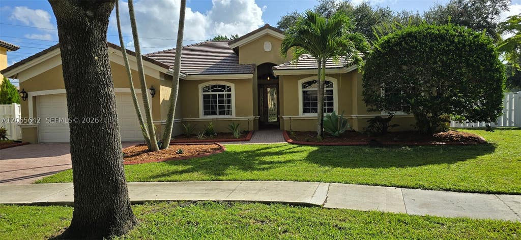 Photo of 2823 Poinciana Cir, Cooper City, FL 33026 (MLS # A12065642)