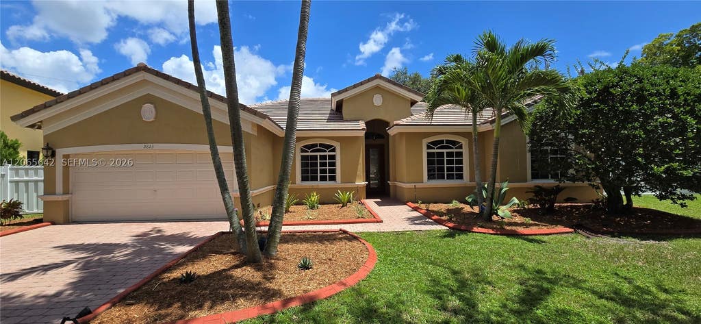 Photo of 2823 Poinciana Cir, Cooper City, FL 33026 (MLS # A12065642)
