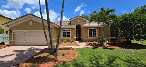 Photo of 2823 Poinciana Cir, Cooper City, FL 33026 (MLS # A12065642)