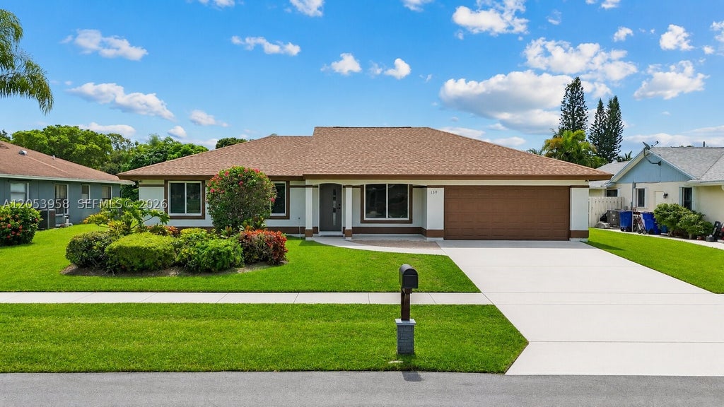 Photo of 139 Galiano St, Royal Palm Beach, FL 33411 (MLS # A12053958)