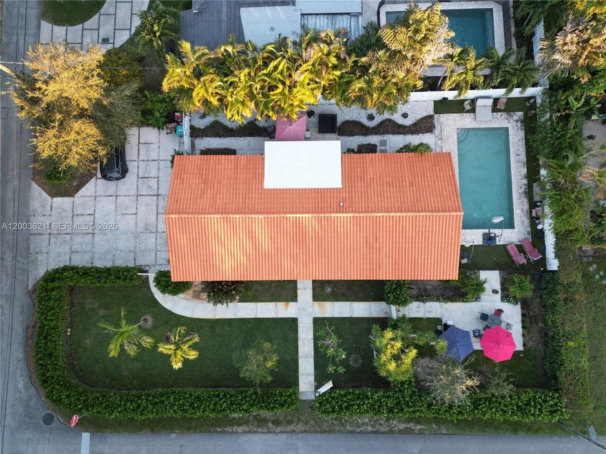 3BR/2BA home in the desirable Biscayne Park, set on a 9,375 SF lot. Features 1,729 SF of living area with a primary suite plus two bedrooms sharing a full bath. Lush, landscaped yard with a true bird sanctuary feel, pool, and dedicated BBQ area—ideal for outdoor living. Spacious garage and parking for up to 6 cars. Quiet, tree-lined neighborhood with great privacy and easy access to main Miami corridors.