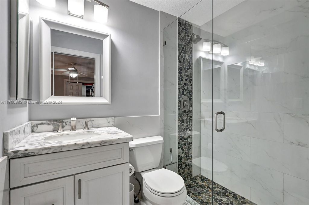 Photo of 117 Lehane Ter #202, North Palm Beach, FL 33408 (MLS # A11700662)