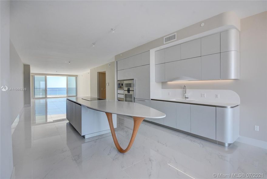 Beautiful HIGH FLOOR 3 bedroom 4 1/2 bath at STUNNING building. FINISHED with PORCELAIN floors and custom WOOD CLOSETS. It features AMAZING OCEAN, intracoastal and skyline VIEWS. Jade Signature was designed by Herzog and DeMeuron (Pritzker prize architects). Interiors designed by Pierre Yves Rochon. Building offers ALL the amenities you want OCEAN front, Beach Bar and Grill, SPA, Yoga, Pilates, Spinning, teen TECH lounge, dinning, pool, GYM, and the list goes on and on. Brand new unit. Come and see it, you won't be disappointed. LET'S MAKE A DEAL.