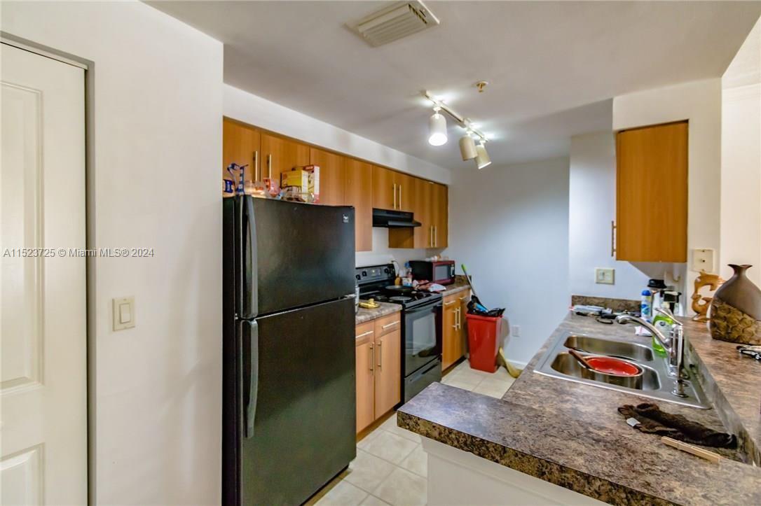 EL-AD POINCIANA CONDO - Residential