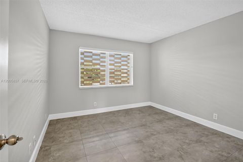 Tiny photo for 3050 NE 16th Ave #407, Oakland Park, FL 33334 (MLS # A12005837)