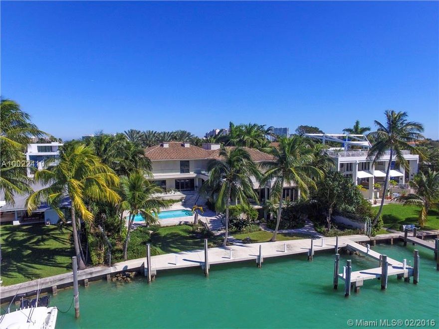 Yachtsman's dream on exclusive Hurricane Harbor.  Views of Biscayne Bay and secluded lagoon throughout incredibly spacious home.  Excellent entertaining home complete with expansive verandas and balconies.  Enjoy movie night in your home theater or relax in the Florida room and enjoy marine wildlife pass by.  Sunset views.  12 car garage.  Easy to show with 24hr notice.