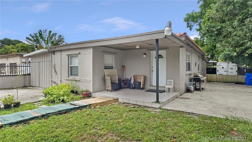 Investor or End-User's dream property!  The main house features a 2/1 singly family home with a 1/1 studio apartment which can be combined back to a 3/2 property, or left separate for an investor / end-user who wants to have separate in-law quarters / rent out the studio.  A/C for the main house is 7 years old and the A/C for the studio is 1 year old.  2 Power gates with 2 driveways (each unit has a private entrance).  Brand new windows less than 2 years old with brand new hurricane shutters.  Corner lot with ample street parking.  The shed on the property will be left to the new owner.