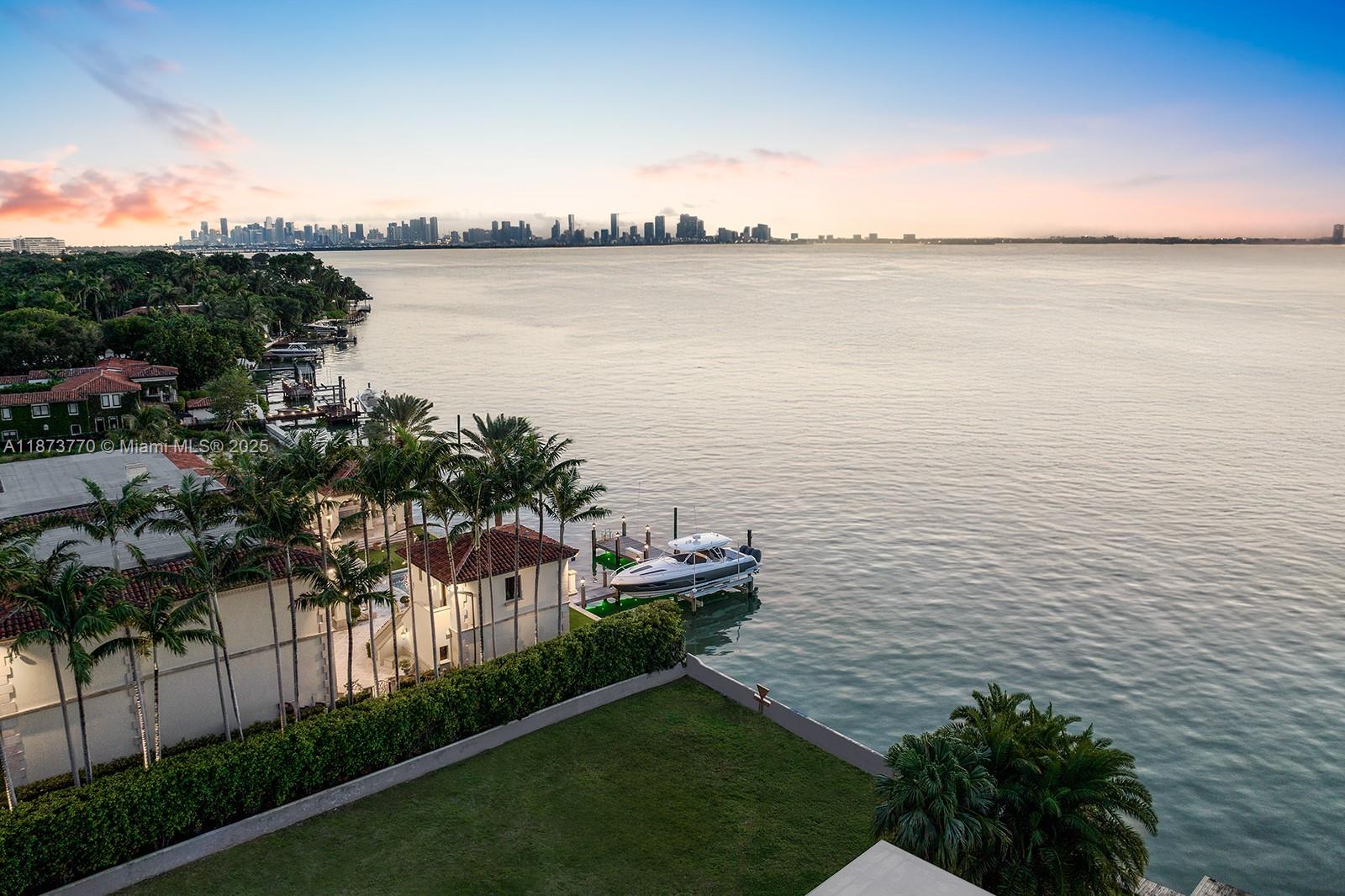 A rare opportunity to own a premier waterfront lot on prestigious North Bay Road, complete with approved plans, permits, and a newly built seawall. This exceptional property offers a blank canvas to create and customize your dream residence in one of South Florida’s most coveted neighborhoods. Enjoy ample entertaining space with new 60ft wide dock featuring Downtown Miami and wide bay views. With direct water access the lot combines privacy, luxury, and an unbeatable location just minutes from world-class golf, dining, shopping, and entertainment.