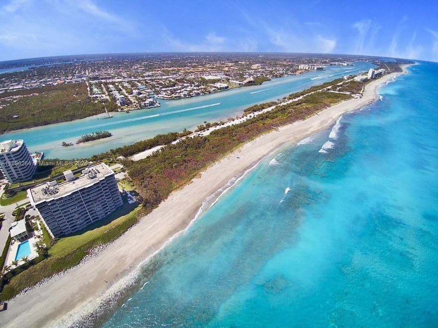 Exquisite and Hard to Find! 8th floor NE corner unit offering breathtaking views of the Blue Atlantic, Jupiter Lighthouse, & Turquoise Intracoastal waterways. This immaculate 3Br/2.5Ba unit is completely renovated with wood flooring... and a massive wrap around balcony. Building features include: a decorator lobby, and a new 2 story rec facility offering a lovely kitchen and second floor state of the art exercise facility... all overlooking one of Jupiter Islands larger pools. This DiVosta (Built Solid) product also offers garage parking and a very large A/C owner storage, meticulous
grounds and spectacular on-site building manager.