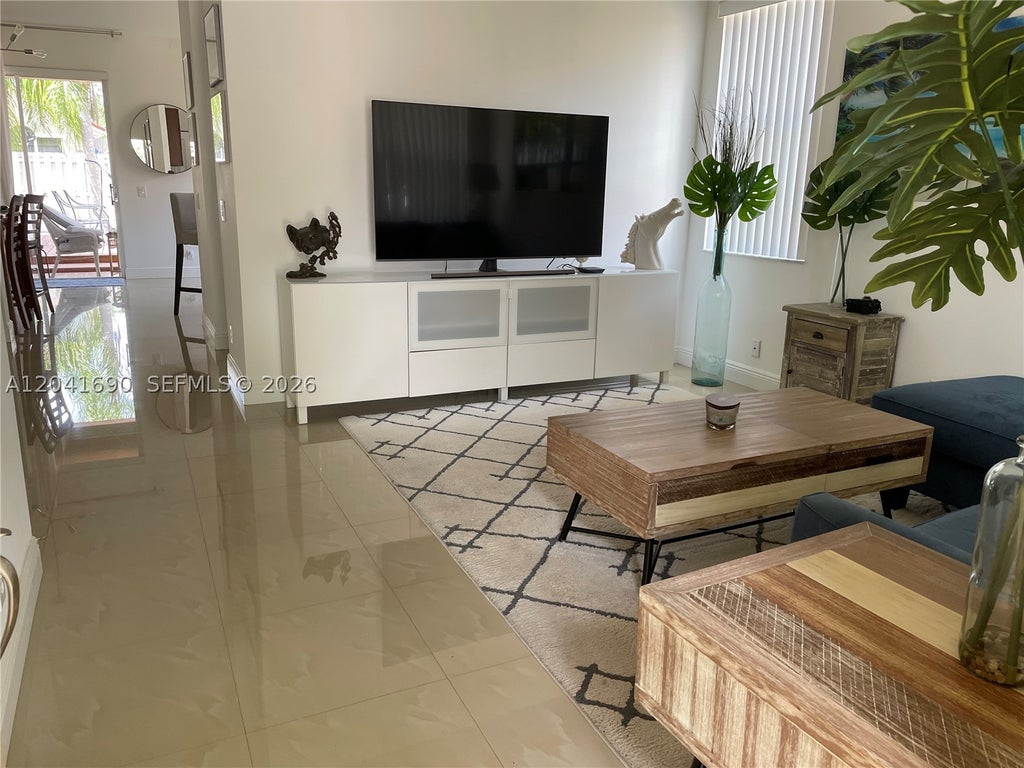 Photo of 805 Falling Water Rd, Weston, FL 33326 (MLS # A12041690)